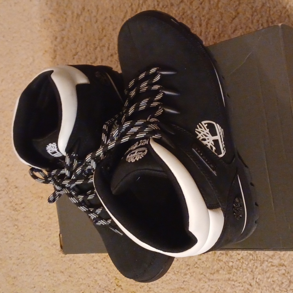 Black and white Timberland ankle boots